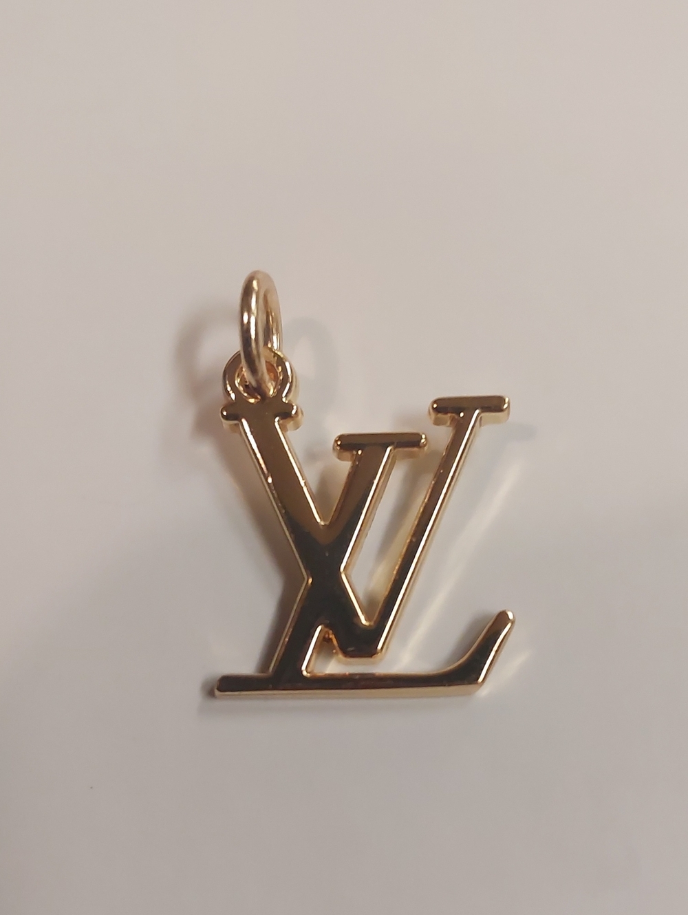 Louis Vuitton Gold LV Logo Pendant Charm